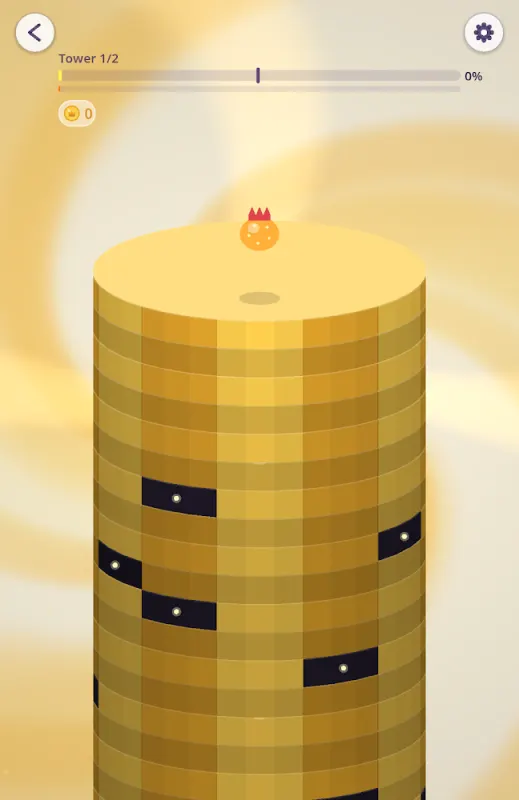 Crown Crush tower of golden plates with dark segments and the ball on top
